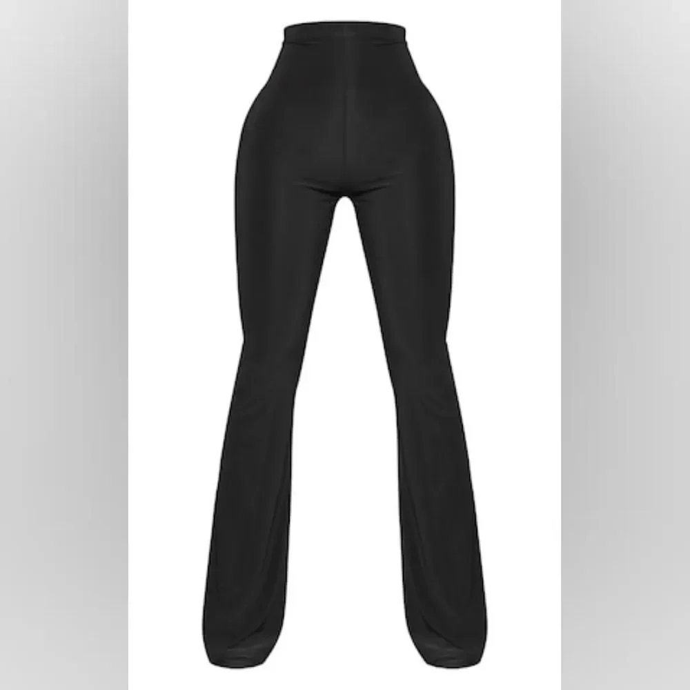 PrettyLittleThing Petite Black Flare Ruched Bum Slinky Pants Size 6 in black NWT